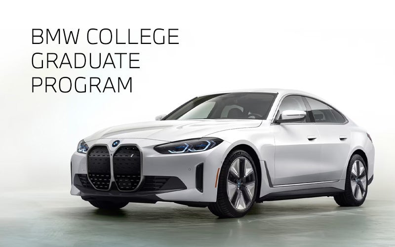 White BMW i4 parked. BMW College Graduate Program. | BMW of Westbrook in Westbrook ME